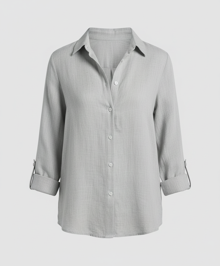 Smart-casual V-neck blouse against a plain background.