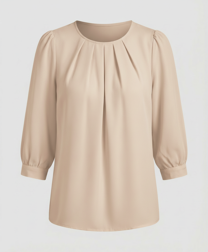 An elegant satin blouse on a plain background.