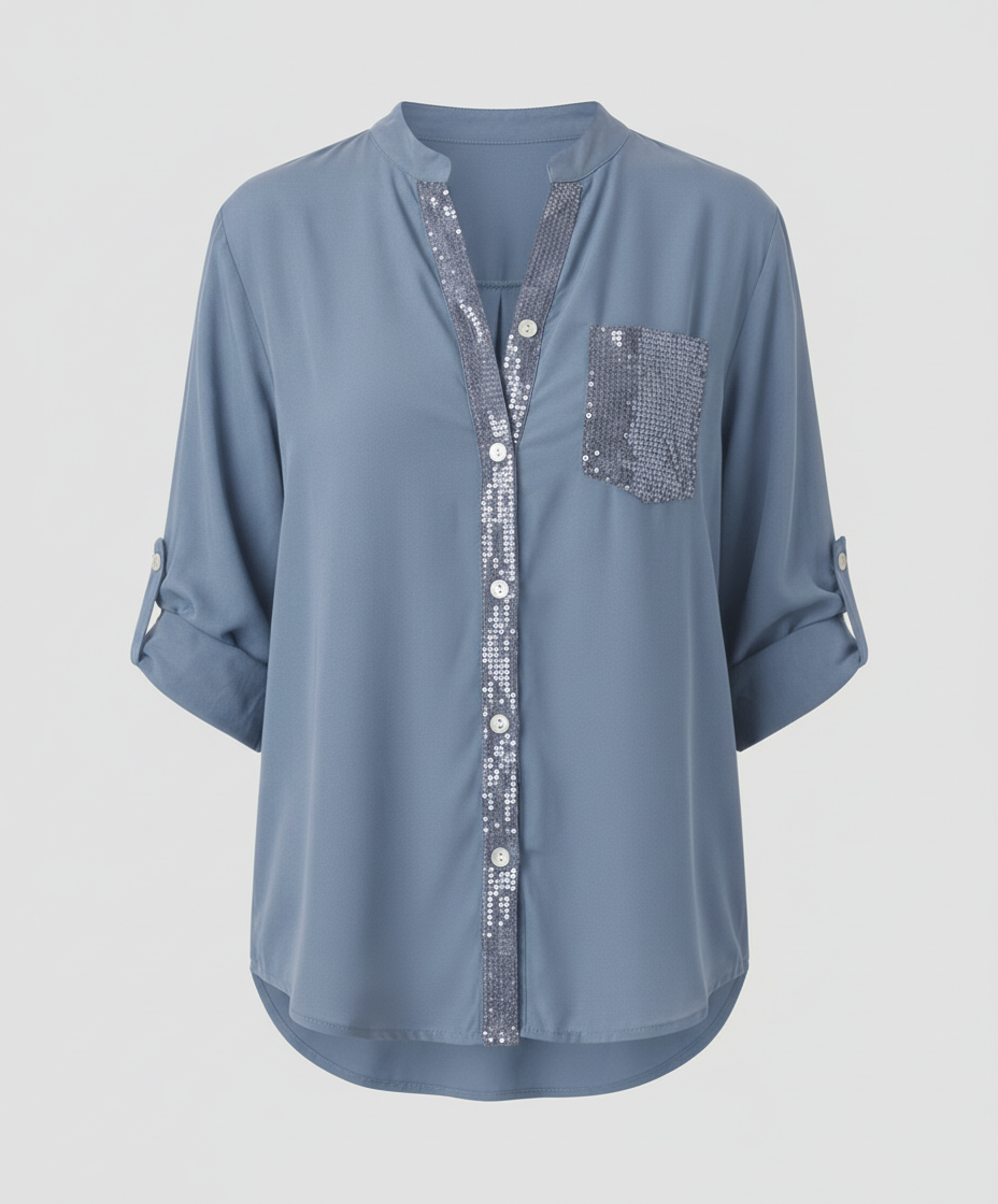 Lightweight blouse with shimmer detail and relaxed fit.