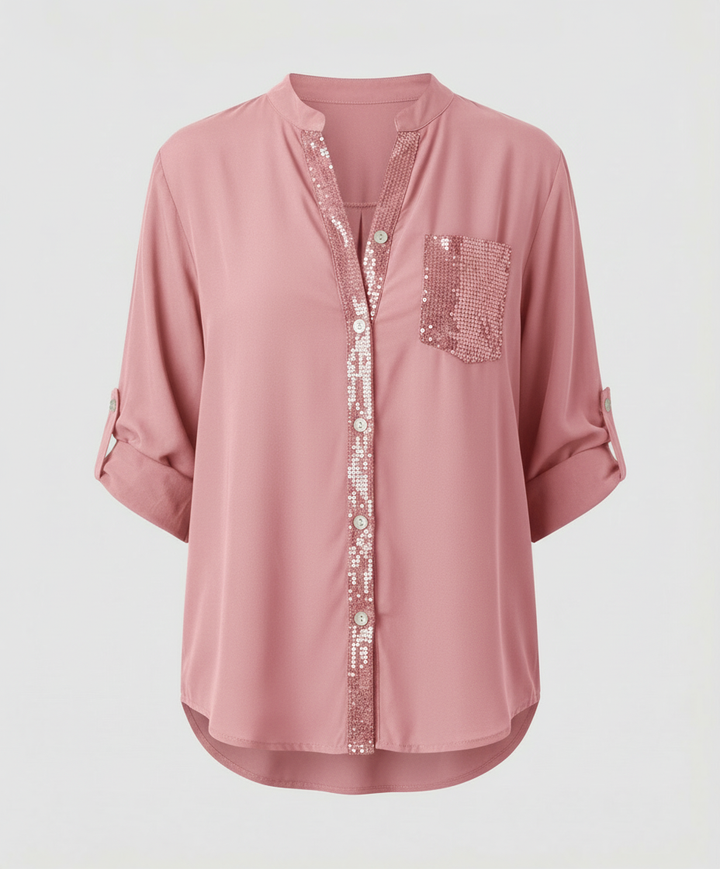 Casual glitter blouse with soft relaxed shape.