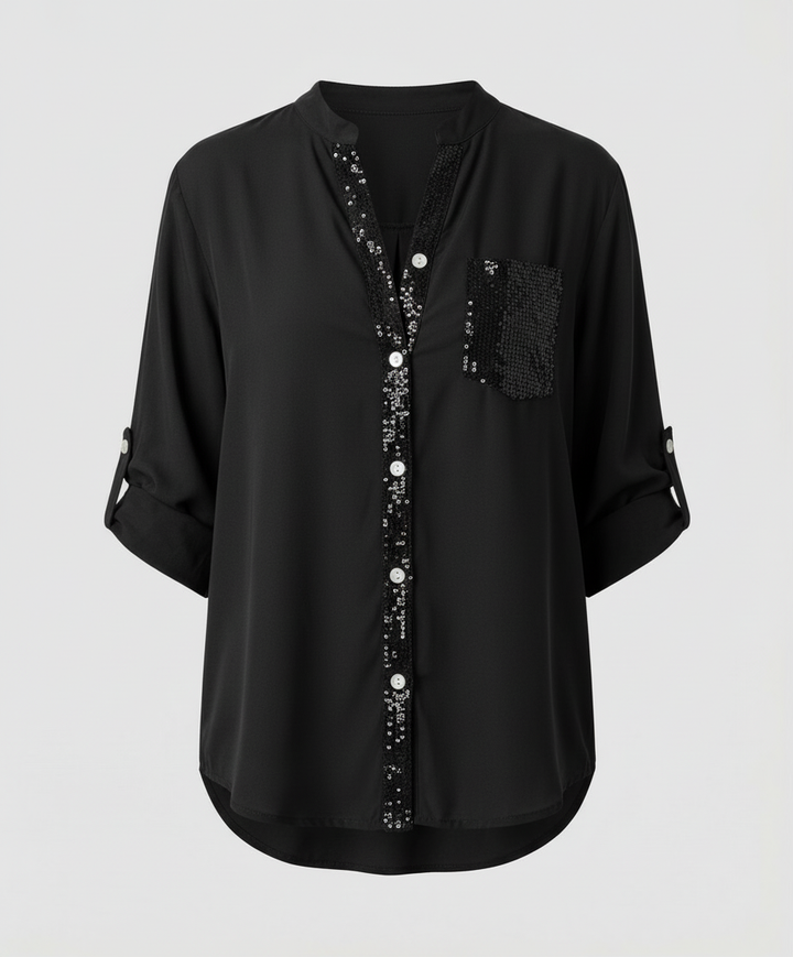 Casual glitter blouse with relaxed everyday styling.