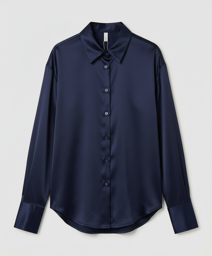 Blouse paired with a clean classic look.