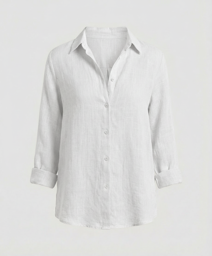 Woman in a relaxed everyday blouse with elegant detailing.