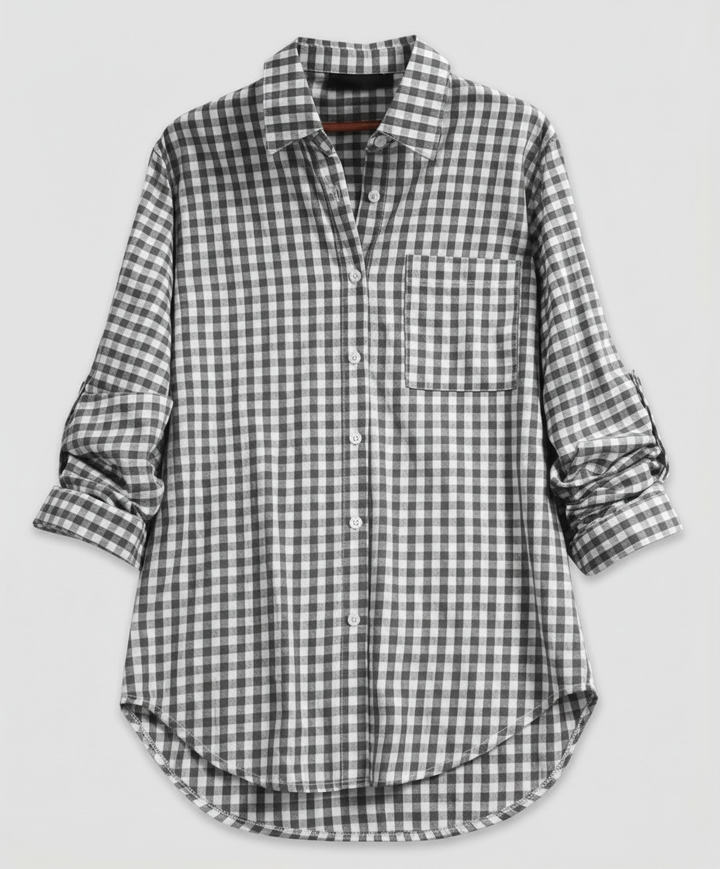 Relaxed checked shirt layered over a simple top.