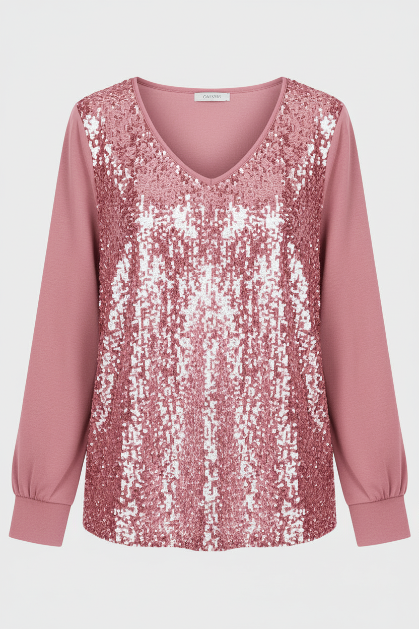 Subtle shimmer blouse styled on a plain background.