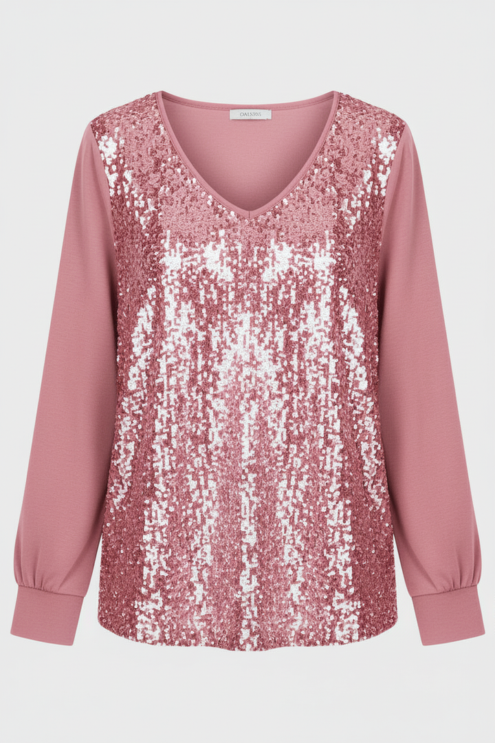 Subtle shimmer blouse styled on a plain background.