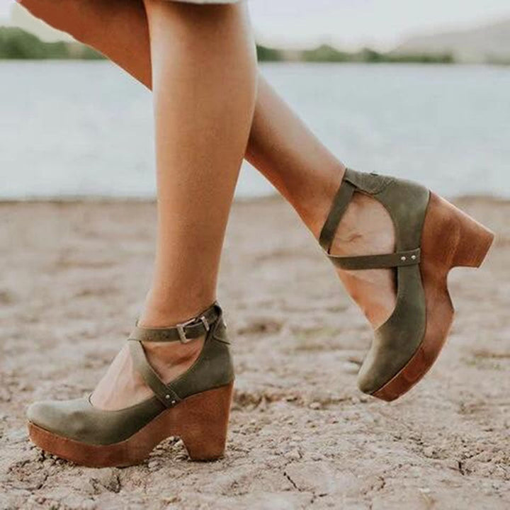  Female model wearing open-toe summer sandals with cushioned sole styling.