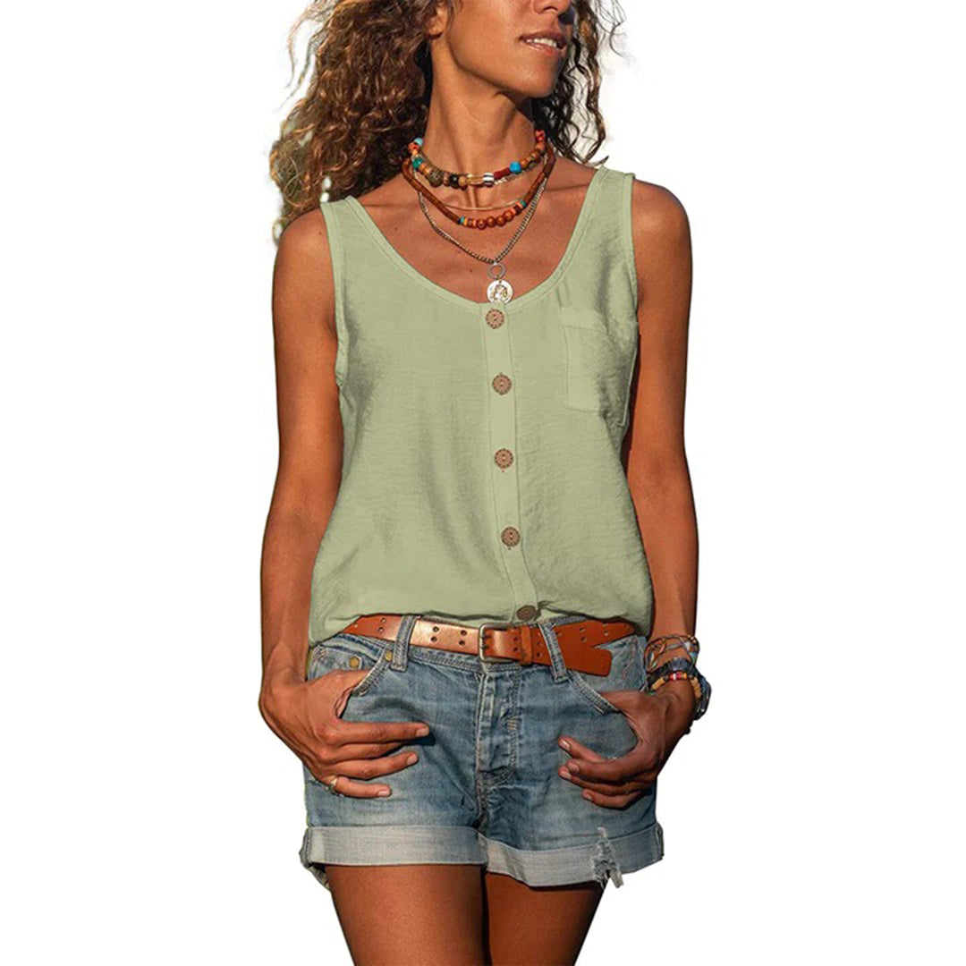  Woman modelling a relaxed casual top with a sleeveless design.