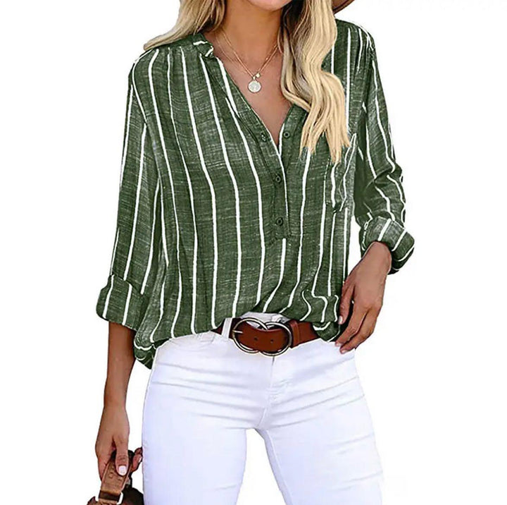 Woman in a striped top with adjustable sleeve styling.