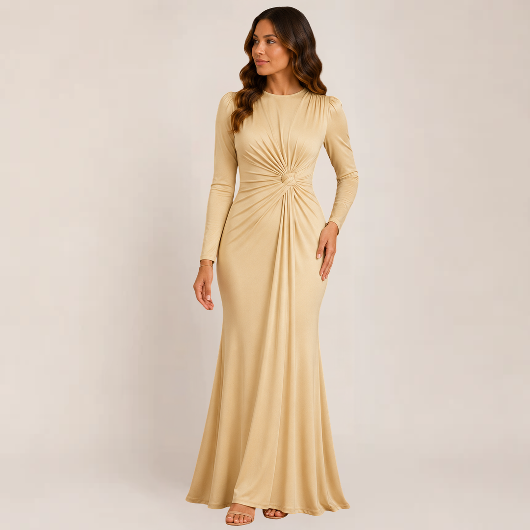 Woman showcasing a sleek semi-formal dress with long sleeves on a plain background.