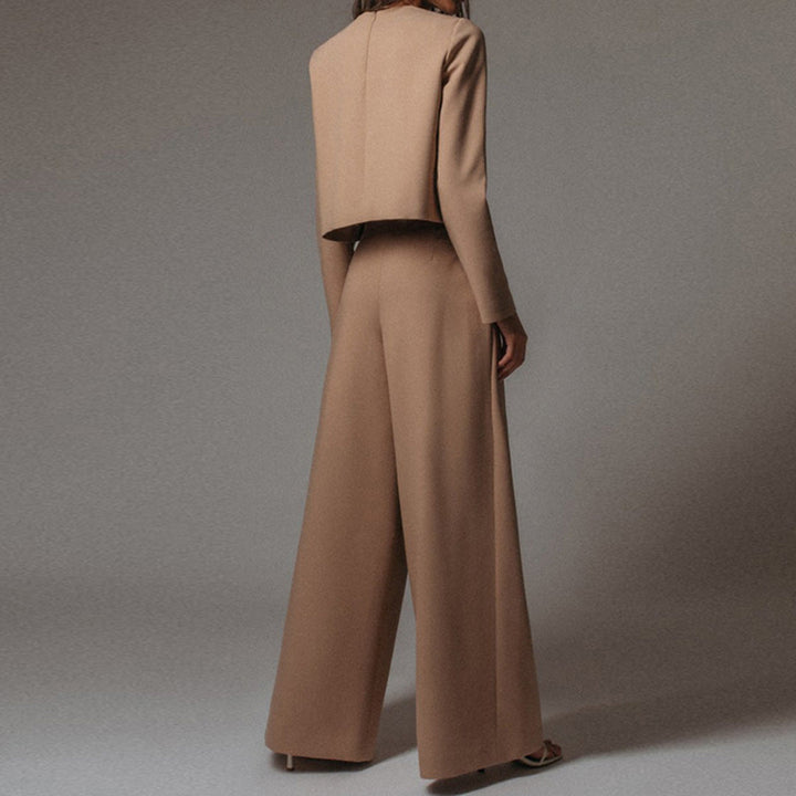 Female wearing a coordinated two-piece look with clean everyday styling.