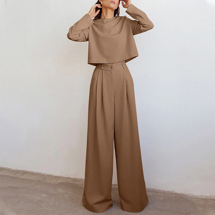 Female modelling a casual matching set with wide-leg cropped trousers.