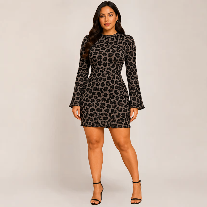 Model wearing a bold animal print bodycon dress against a plain background.