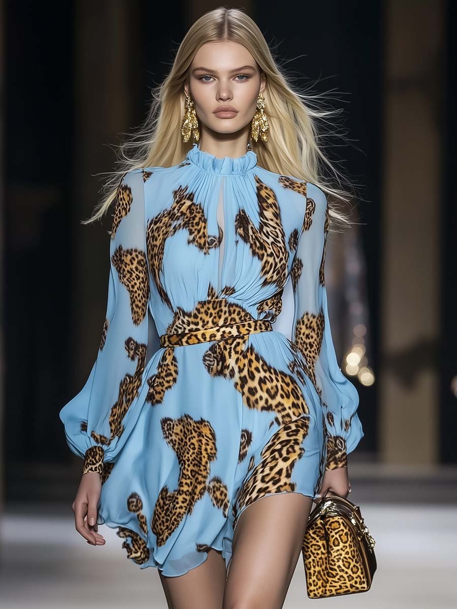 Woman in a blue animal print mini dress with puff sleeves on a plain background.