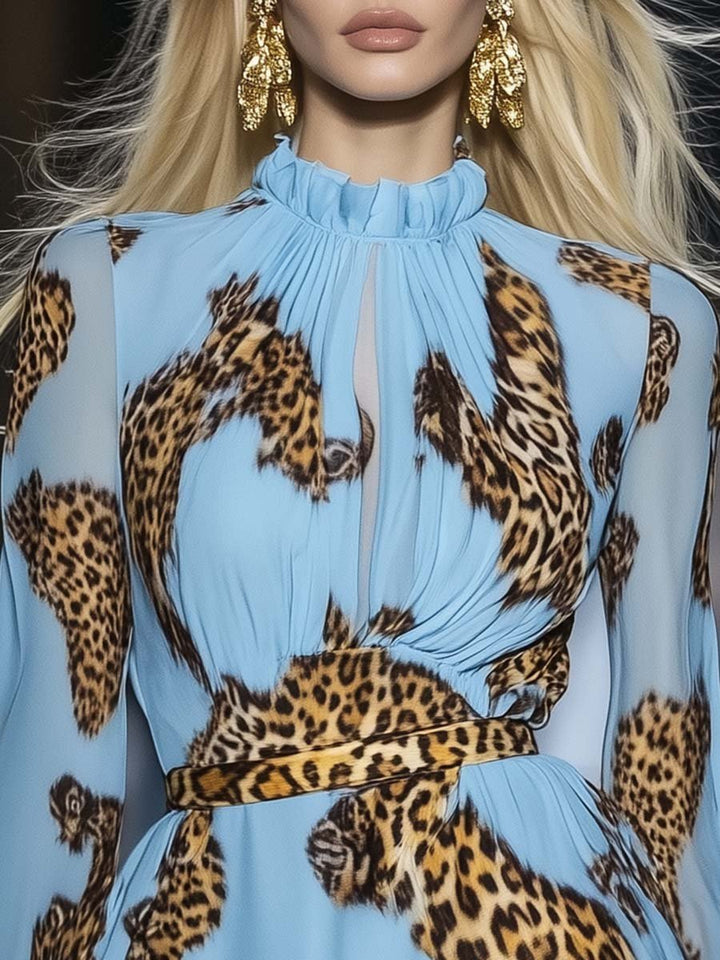 Model wearing a ruffle neckline leopard print dress against a plain background.
