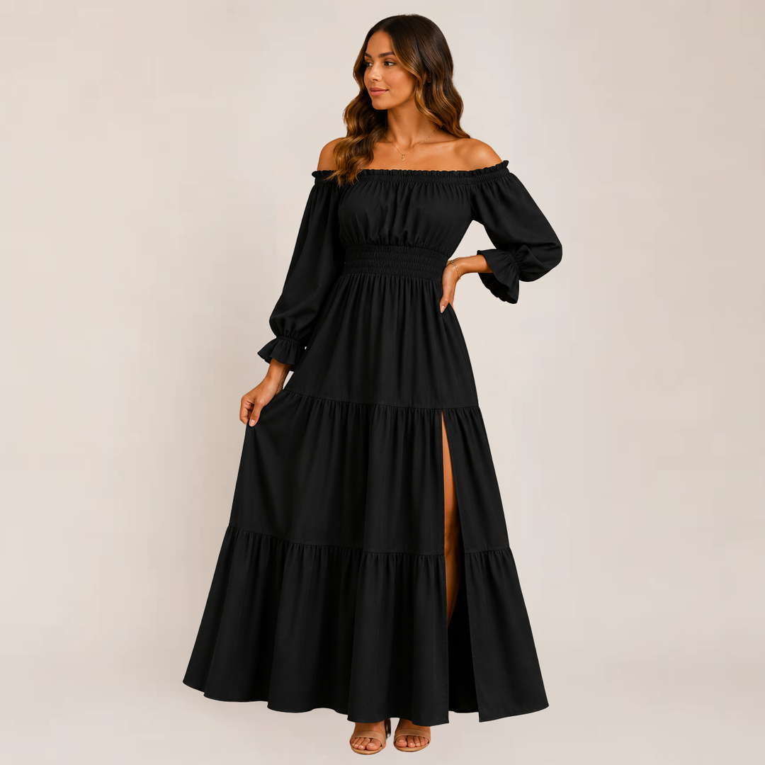 Model showcasing a lightweight tiered midi dress with an off-shoulder neckline on a plain background.