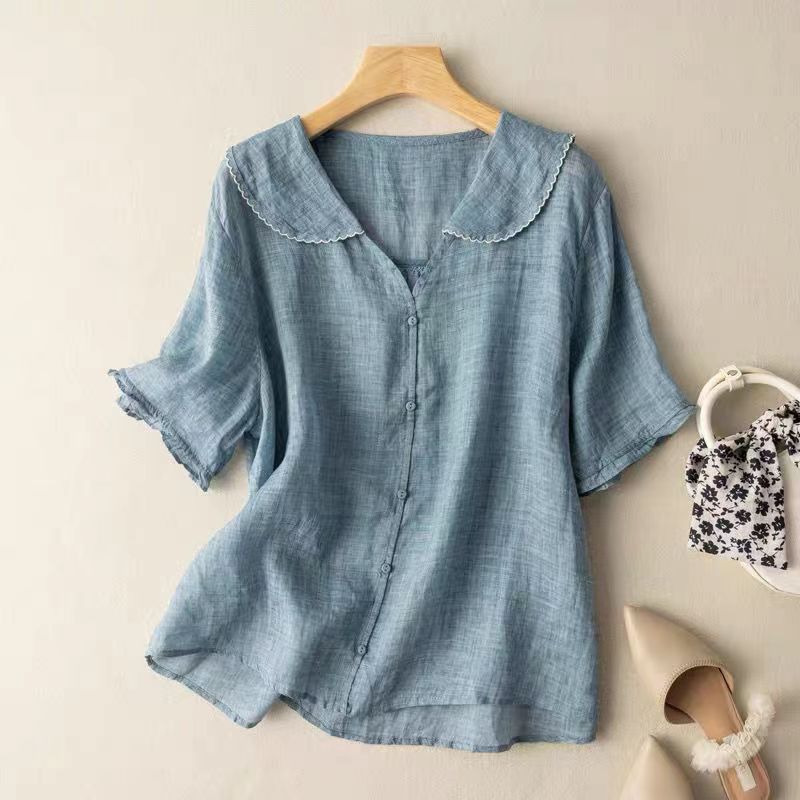Lightweight long-sleeve blouse with a vintage-inspired design.