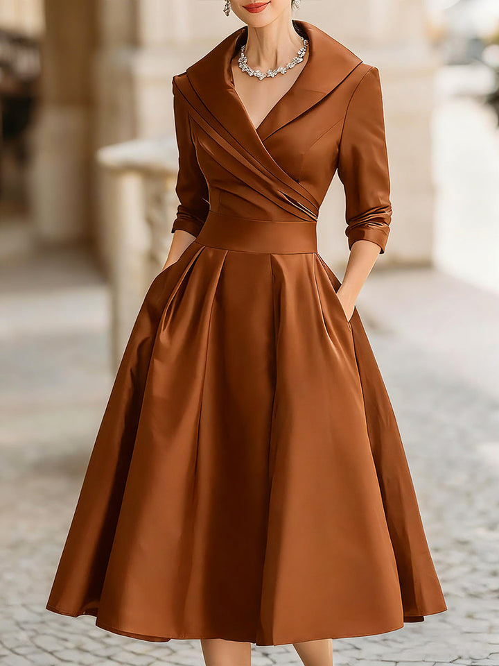 Model in a graceful midi dress 