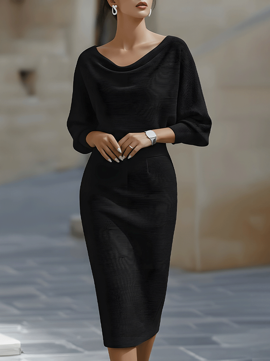 Model wearing a white fitted midi dress with batwing sleeves on a plain background.