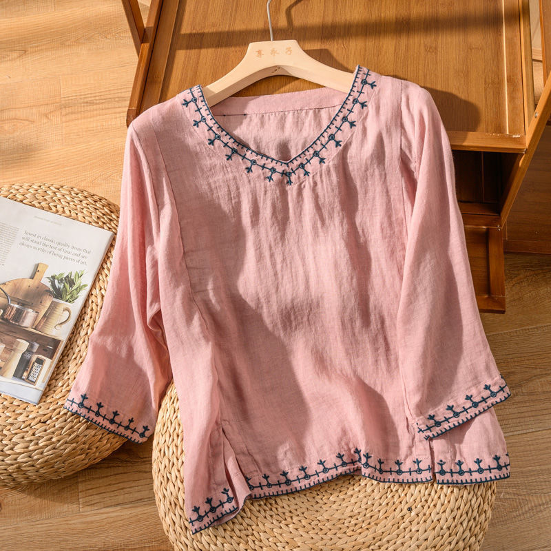 A relaxed fit blouse with delicate stitched detailing.