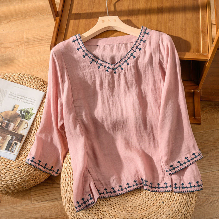 A relaxed fit blouse with delicate stitched detailing.