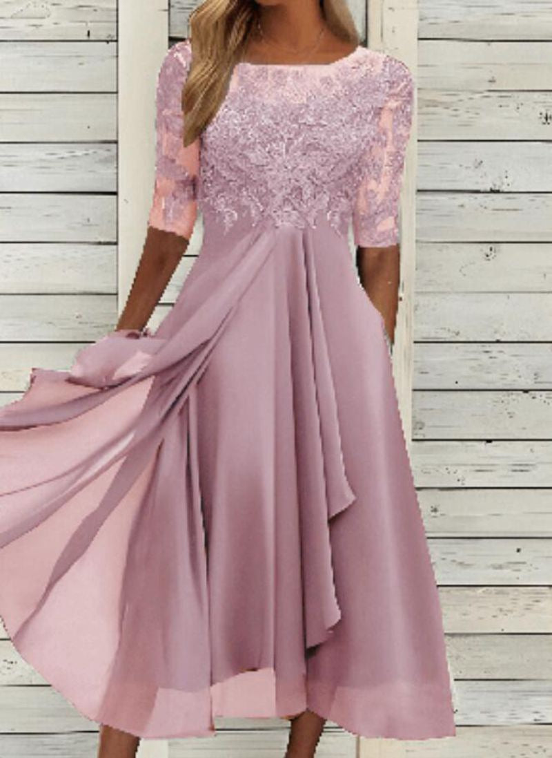 Woman showcasing a graceful evening dress suitable for weddings on a plain background.