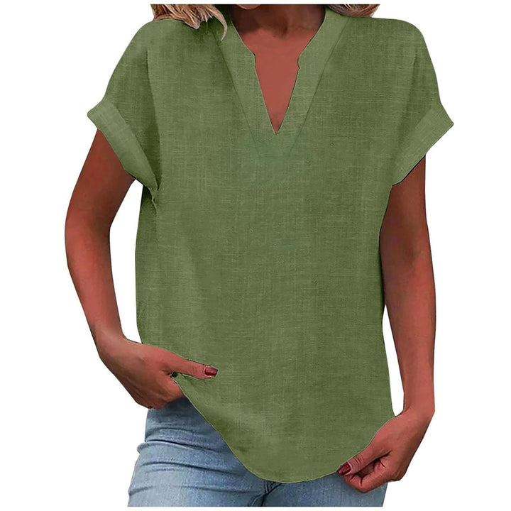  Female modelling a casual blouse with rolled sleeve detail.