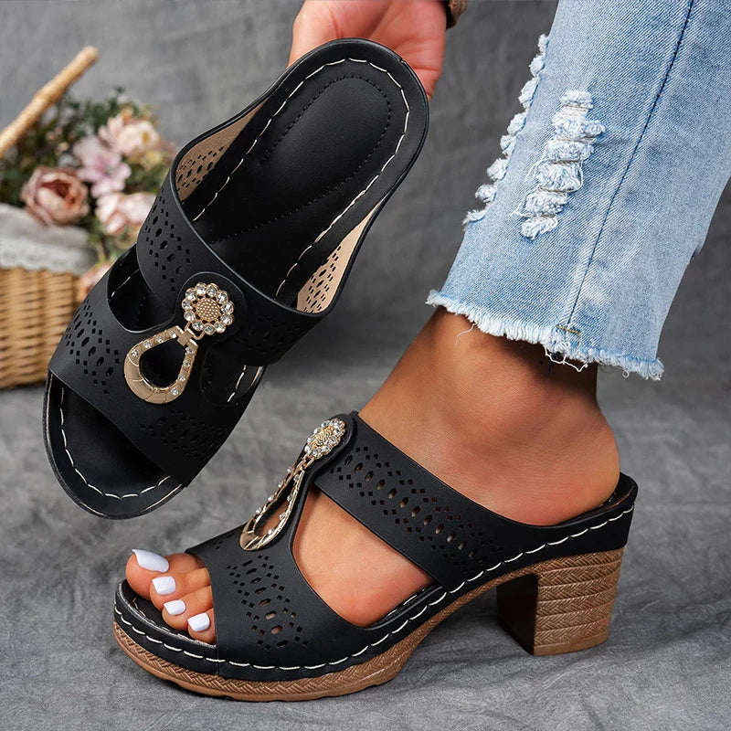 Female model wearing breathable cutout sandals on a plain background.