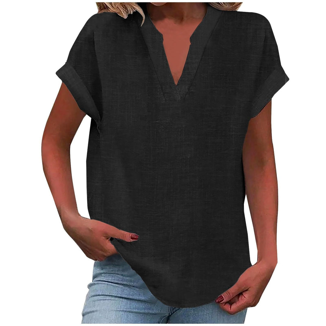 Woman modelling a smart-casual blouse with a smooth drape.