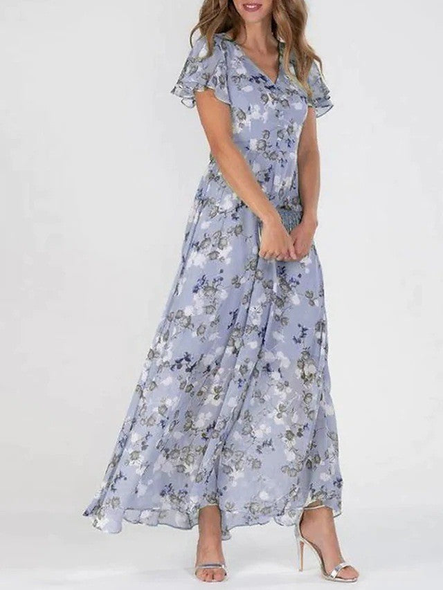 Woman in a graceful midi dress styled for work or evening wear.