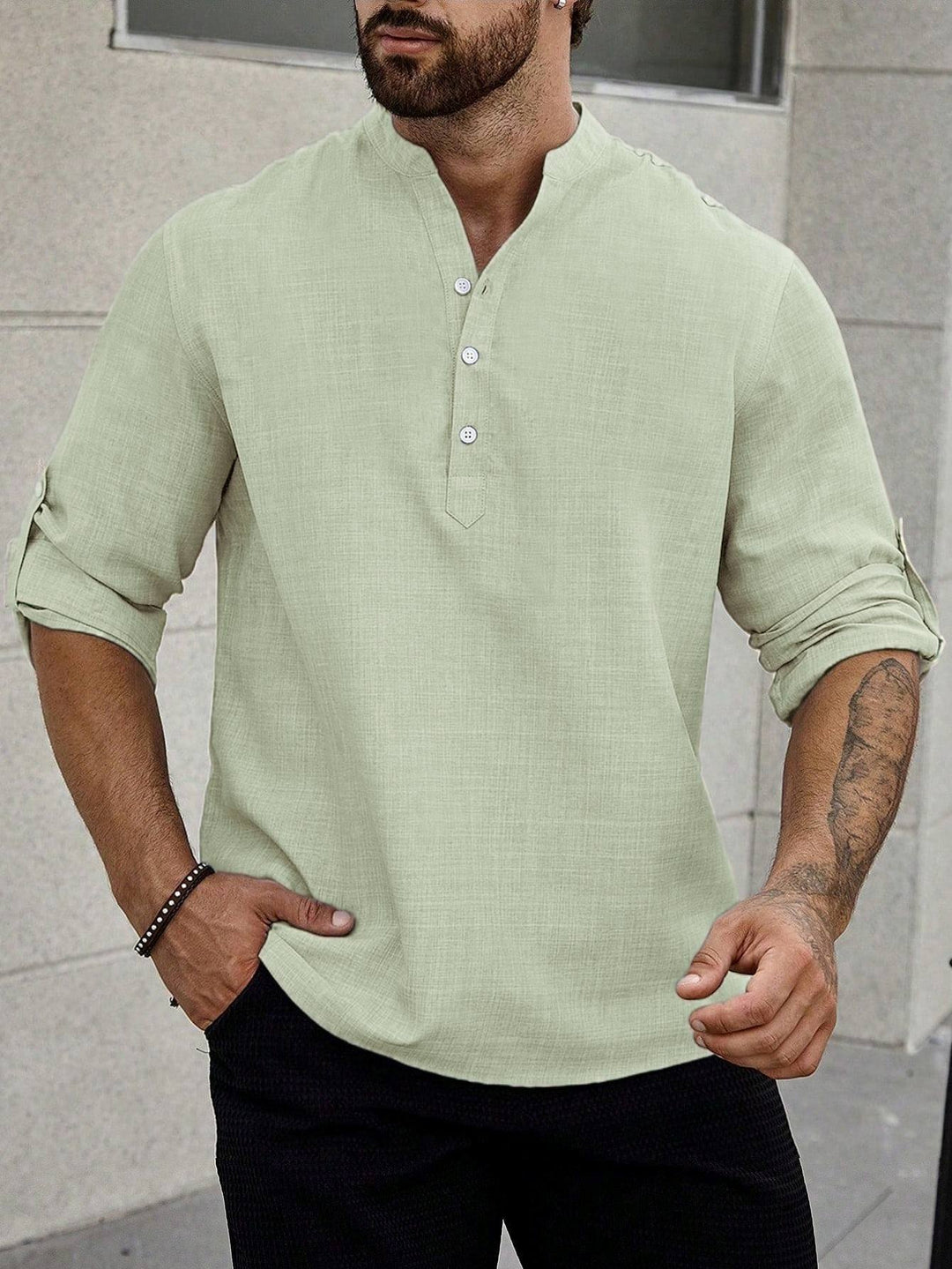 Male model in a modern casual shirt with long sleeves.