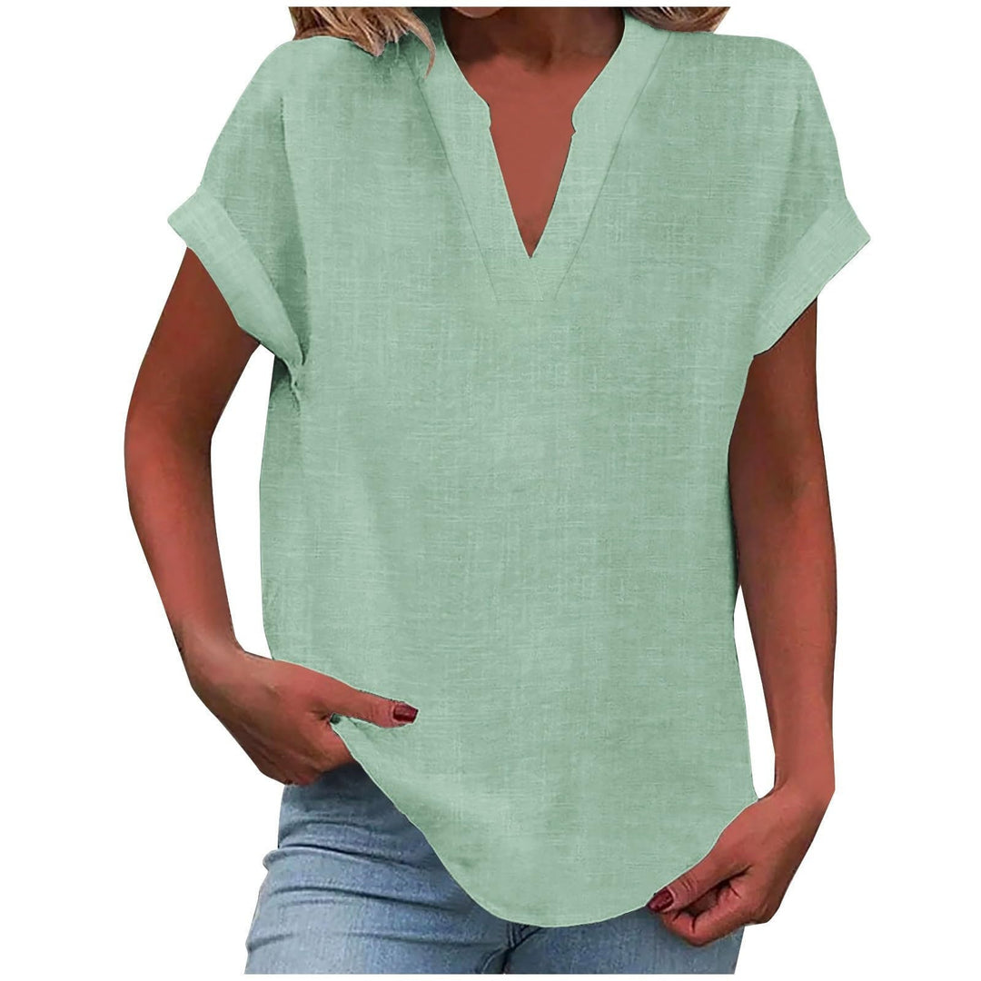  Female in a notched-neck blouse styled for casual daily wear.