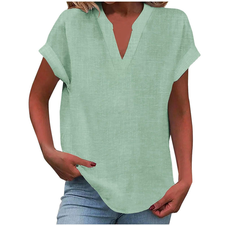  Female in a notched-neck blouse styled for casual daily wear.