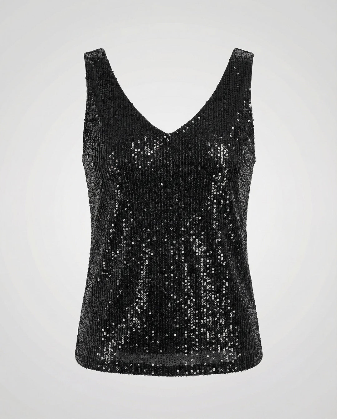 Glamorous sequin top with casual styling.