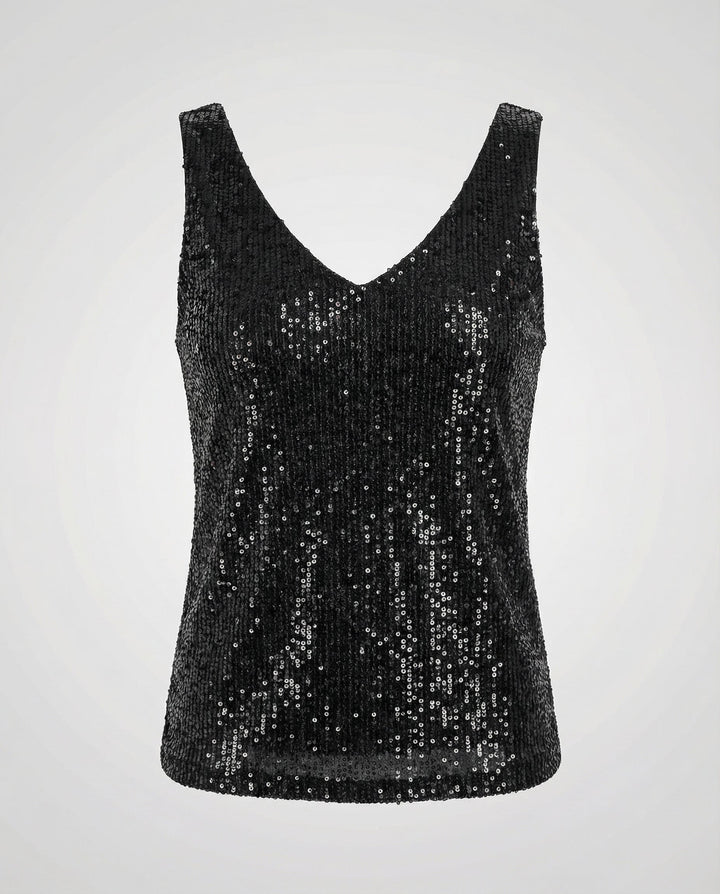Glamorous sequin top with casual styling.