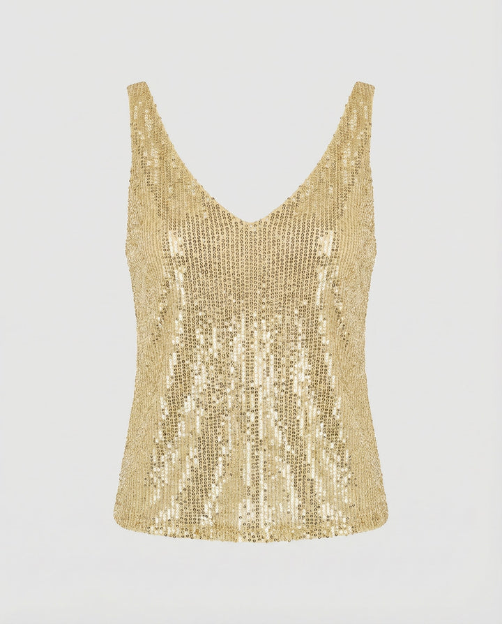 Shimmering party top on a plain background.