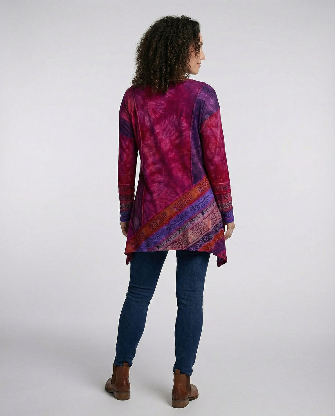 Woman in a patterned vintage-style tunic designed for casual everyday wear.