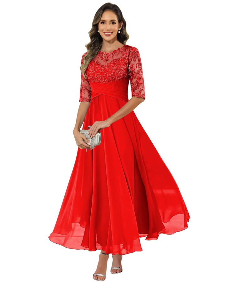 Woman wearing a graceful long dress for formal events on a plain background.
