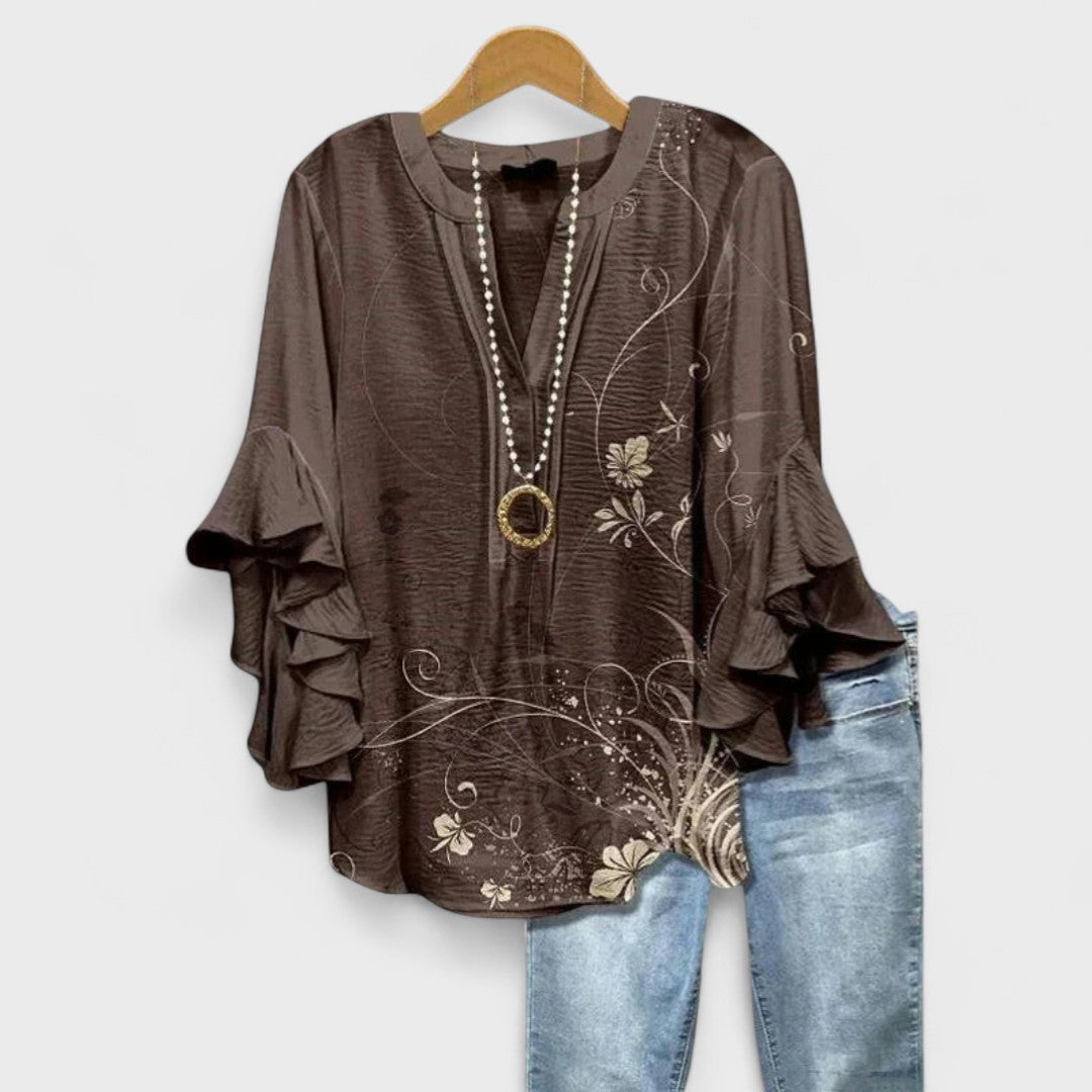Airy blouse paired for simple everyday styling.