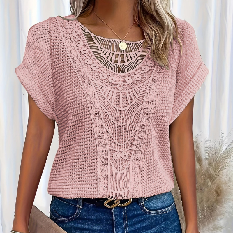  Woman in a delicate lace top styled for warm-weather wear. 