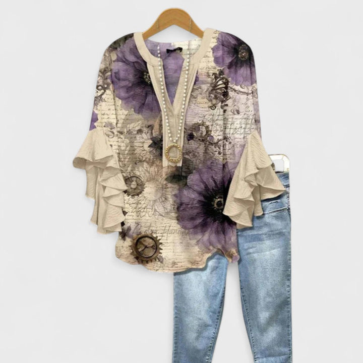 Daily wear blouse against a clean plain background.