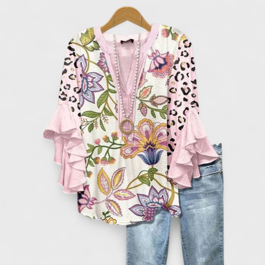 Lightweight blouse shown on a plain studio background.