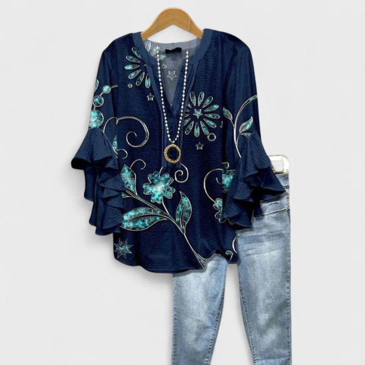 Feminine blouse for daily styling.