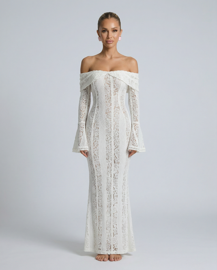 Woman wearing an off-shoulder lace maxi dress with long flared sleeves against a plain background.