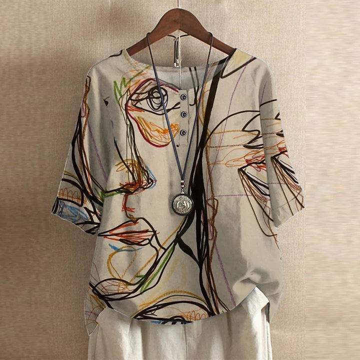 A long sleeve floral blouse suitable for casual and smart occasions.