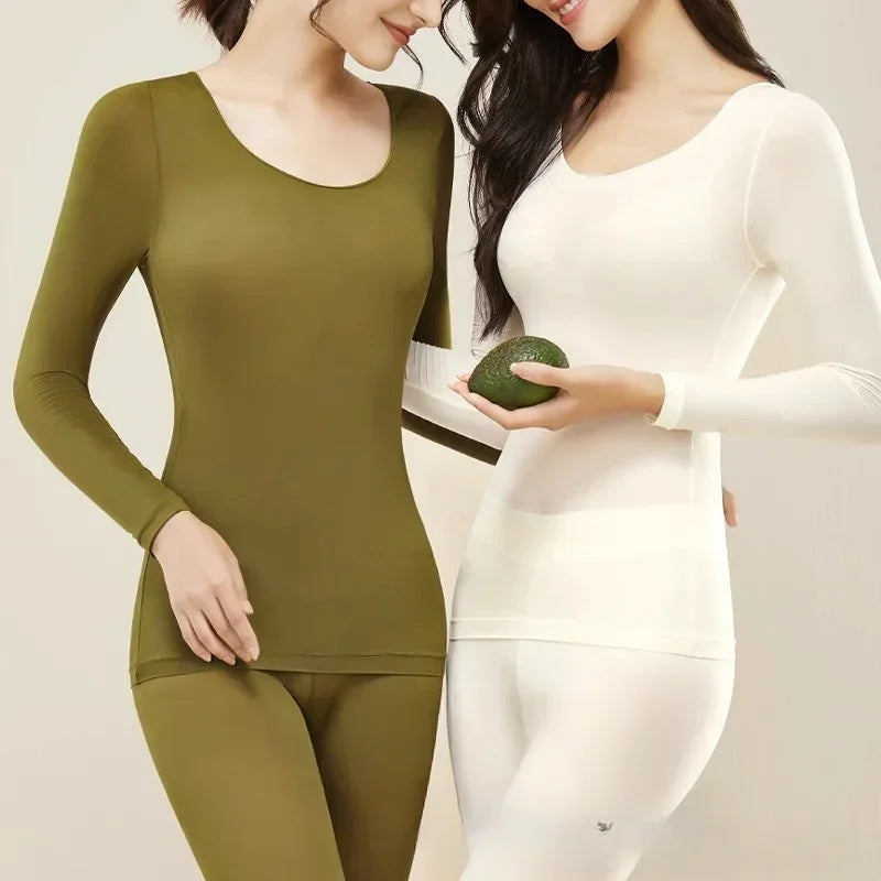 Female modelling a slim-fit thermal set with a round neckline and full-length leggings.