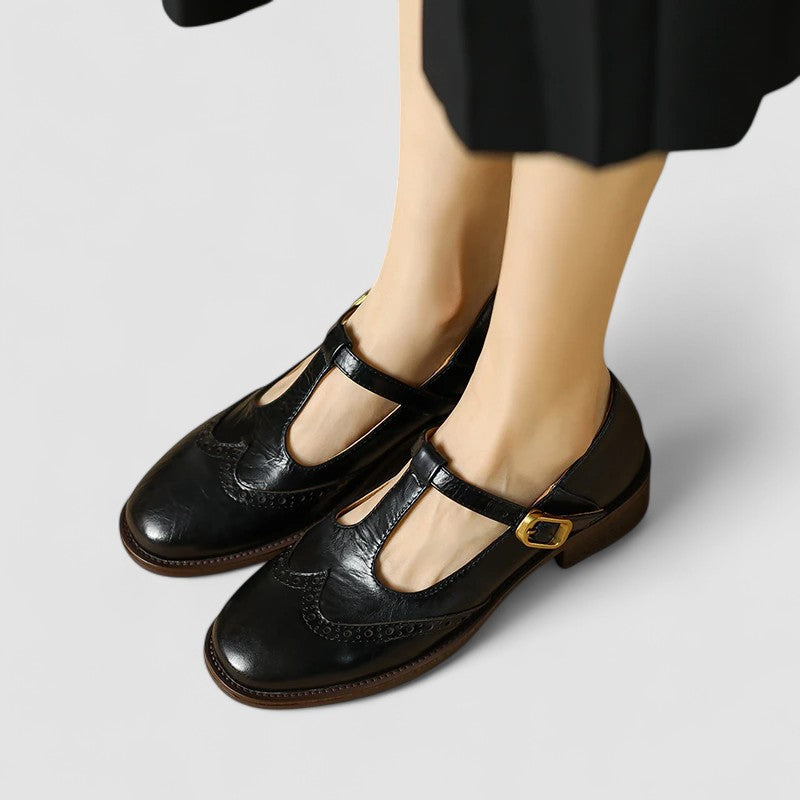Casual Mary Jane flat shoes displayed on a plain background.