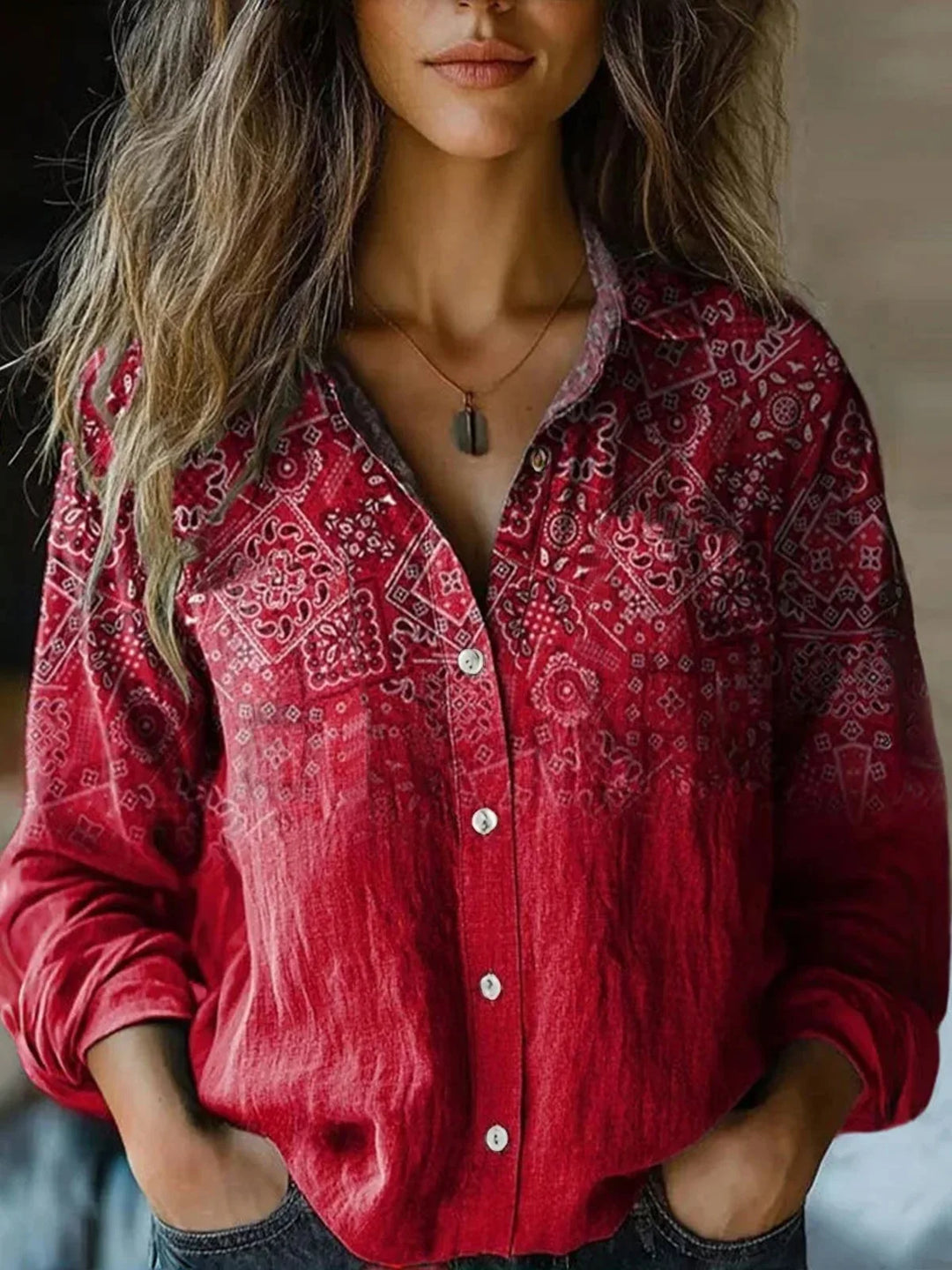  Female in a patterned shirt with a relaxed silhouette and chest pocket.