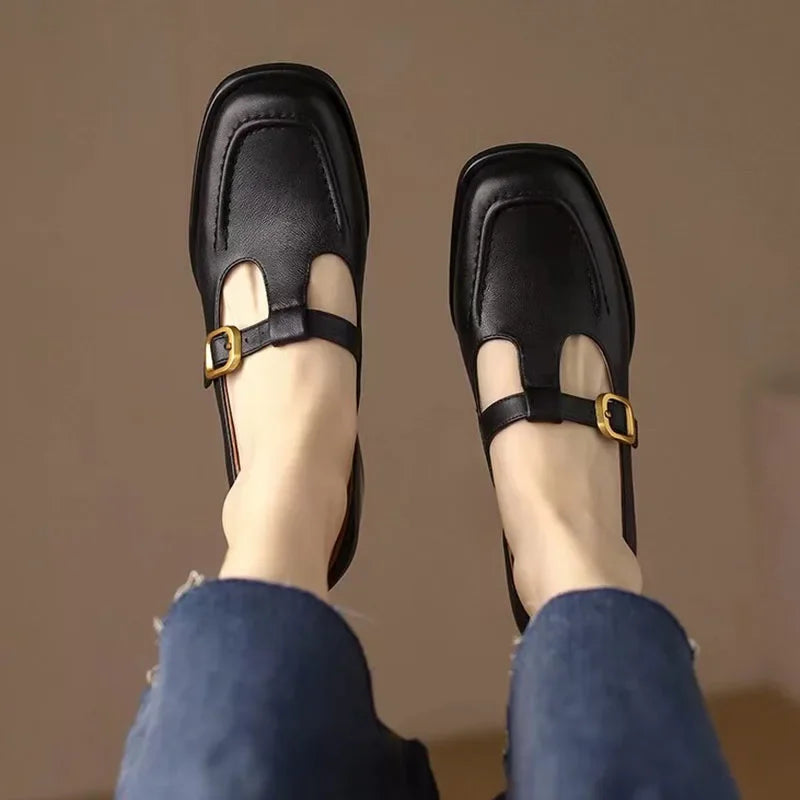 Woman wearing square toe shoes styled with a simple outfit.
