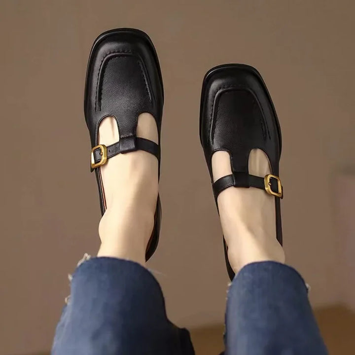 Woman wearing square toe shoes styled with a simple outfit.